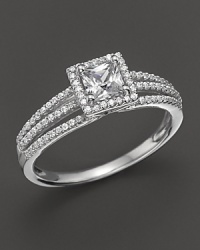 Elegant ring with princess-cut center stone micro-pave diamond trim. Elegant ring with princess-cut center stone micro-pave diamond trim.