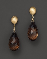 Smoky quartz drops dangle from 14K yellow gold settings. Smoky quartz drops dangle from 14K yellow gold settings.