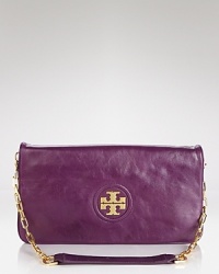 Tory Burch's signature logo plaque dresses up this luxe vegan leather clutch. Carry it to take the label's city sleek style out for the night. Tory Burch's signature logo plaque dresses up this luxe vegan leather clutch. Carry it to take the label's city sleek style out for the night.