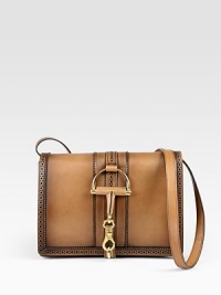 Hand-shaded leather design with brogue detail and a horsebit clasp closure. Adjustable leather shoulder strap, 14½-16½ dropFlap and push-lock closureOne inside center zip compartmentOne inside zip pocketThree inside open pocketsNatural linen lining10½W X 7H X 3½DMade in Italy Hand-shaded leather design with brogue detail and a horsebit clasp closure. Adjustable leather shoulder strap, 14½-16½ dropFlap and push-lock closureOne inside center zip compartmentOne inside zip pocketThree inside open pocketsNatural linen lining10½W X 7H X 3½DMade in Italy