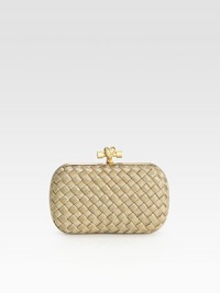 This petite design features goldtone mesh in an elegant woven pattern and an unique knot detailed closure.Top clasp closureSuede lining7¼W X 4¼H X ¾DMade in Italy This petite design features goldtone mesh in an elegant woven pattern and an unique knot detailed closure.Top clasp closureSuede lining7¼W X 4¼H X ¾DMade in Italy