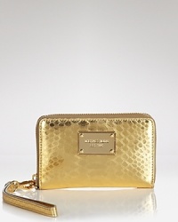 Lend your technology a touch of MICHAEL Michael Kors' luxe with this embossed leather iPhone wristlet, fashioned to keep your phone at your fingertips. Lend your technology a touch of MICHAEL Michael Kors' luxe with this embossed leather iPhone wristlet, fashioned to keep your phone at your fingertips.