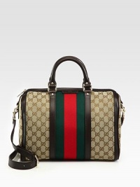 GG fabric with signature web detail, goldtone hardware and leather trim.Double top handle, 4 drop Adjustable shoulder strap, 17-21 drop Zipper closure One inside zip pocket; two open Metal feet Leather trim Fully lined 13W X 8¾H X 7D Made in Italy GG fabric with signature web detail, goldtone hardware and leather trim.Double top handle, 4 drop Adjustable shoulder strap, 17-21 drop Zipper closure One inside zip pocket; two open Metal feet Leather trim Fully lined 13W X 8¾H X 7D Made in Italy