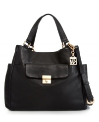 Whether dashing across town or across the country, this versatile design from DKNY will get you there in style. A roomy interior and optional crossbody strap add function to this gorgeous look. Whether dashing across town or across the country, this versatile design from DKNY will get you there in style. A roomy interior and optional crossbody strap add function to this gorgeous look.