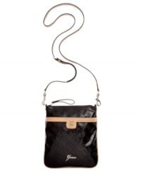 A pretty patent look that brings the shine. This travel-ready crossbody is the ideal shape and size for the busy girl-on-the-go. Gold-tone hardware and an embossed exterior perfectly complete this style. A pretty patent look that brings the shine. This travel-ready crossbody is the ideal shape and size for the busy girl-on-the-go. Gold-tone hardware and an embossed exterior perfectly complete this style.