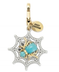 Weave a web of fierce fashion with this spider web charm from Juicy Couture. With glass accents, logo tag and colorful epoxy. Finished with a lobster clasp. Crafted in gold tone mixed metal. Approximate drop: 2 inches. Weave a web of fierce fashion with this spider web charm from Juicy Couture. With glass accents, logo tag and colorful epoxy. Finished with a lobster clasp. Crafted in gold tone mixed metal. Approximate drop: 2 inches.