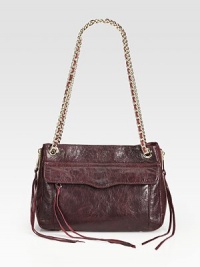 Trim stitching and sleek buckles add city girl style to this carryall of distressed Italian leather. Buckle top handles, 5½ dropAdjustable detachable shoulder strap, 19½-23 dropTop zip closureOne outside zip pocketProtective metal feetOne inside zip pocketThree inside open pocketsCotton lining13¼W X 9¼H X 4½DImported of Italian fabric Trim stitching and sleek buckles add city girl style to this carryall of distressed Italian leather. Buckle top handles, 5½ dropAdjustable detachable shoulder strap, 19½-23 dropTop zip closureOne outside zip pocketProtective metal feetOne inside zip pocketThree inside open pocketsCotton lining13¼W X 9¼H X 4½DImported of Italian fabric