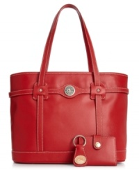 Designed for the diva who doesn't travel light, this ultra-spacious tote from Dooney & Bourke stashes all your essentials in style. Crafted of luxe leather with refined detailing, it comes with a complementary mini wallet and key chain. Designed for the diva who doesn't travel light, this ultra-spacious tote from Dooney & Bourke stashes all your essentials in style. Crafted of luxe leather with refined detailing, it comes with a complementary mini wallet and key chain.