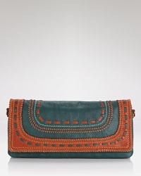 Opt for an artisan approach to accessorizing with this leather clutch from Isabella Fiore, boasting an on-trend shape and free-spirited look. It's the perfect piece for giving your breezy summer looks a boho boost. Opt for an artisan approach to accessorizing with this leather clutch from Isabella Fiore, boasting an on-trend shape and free-spirited look. It's the perfect piece for giving your breezy summer looks a boho boost.