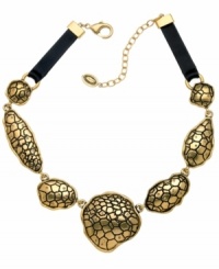 Ssseriously ssstylish! Embossed python adds an exotic edge to this striking statement necklace from T Tahari's Python Collection. Adorned with sparkling light Colorado crystals and leather trim, it's crafted in antique gold tone mixed metal. Approximate length: 17 inches + 3-inch extender. Ssseriously ssstylish! Embossed python adds an exotic edge to this striking statement necklace from T Tahari's Python Collection. Adorned with sparkling light Colorado crystals and leather trim, it's crafted in antique gold tone mixed metal. Approximate length: 17 inches + 3-inch extender.
