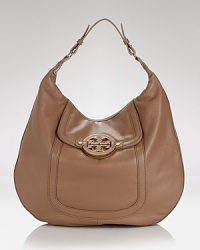 Give them the luxe shoulder. This hobo bag from Tory Burch flaunts an enviable design, crafted from rich pebbled leather with a perfectly proportioned silhouette that goes from desk to dinner with ease. Give them the luxe shoulder. This hobo bag from Tory Burch flaunts an enviable design, crafted from rich pebbled leather with a perfectly proportioned silhouette that goes from desk to dinner with ease.