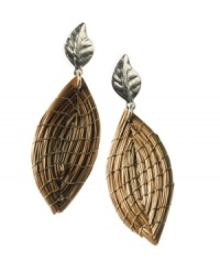 Through the use of indigenous fiber materials like buri and organic golden grass, found only in Brasil, Art da Terra creates handcrafted costume and fashion jewelry and handbags. The technique of intertwining golden grass, natural fibers and textiles into intricate designs by hand adds distinctive character to Art da Terra's creations. Own a piece of Brasil with these leaf shaped earrings made from golden straw found in the Amazon. Discover Brasil. The bold colors. The exotic scents. The sensual textures. The natural sensations. Only at Macy's. Through the use of indigenous fiber materials like buri and organic golden grass, found only in Brasil, Art da Terra creates handcrafted costume and fashion jewelry and handbags. The technique of intertwining golden grass, natural fibers and textiles into intricate designs by hand adds distinctive character to Art da Terra's creations. Own a piece of Brasil with these leaf shaped earrings made from golden straw found in the Amazon. Discover Brasil. The bold colors. The exotic scents. The sensual textures. The natural sensations. Only at Macy's.