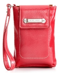 Now you're talking. Let your spring fling last all year 'round with this colorful, compact design from Nine West that features plenty of compartments to stash cash, cards, coins and phone without a worry. And the adorable wristlet strap instantly turns a functional case into a fashionable accessory. Now you're talking. Let your spring fling last all year 'round with this colorful, compact design from Nine West that features plenty of compartments to stash cash, cards, coins and phone without a worry. And the adorable wristlet strap instantly turns a functional case into a fashionable accessory.