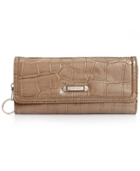 Sass with class, this croc-embossed pattern clutch from Nine West is the perfect balance of edge and elegance. Faux patent leather lends sleek shine along with custom silver-tone hardware, while the well-organized interior is aligned with card slots, bill compartments and extra pockets for other essentials. Sass with class, this croc-embossed pattern clutch from Nine West is the perfect balance of edge and elegance. Faux patent leather lends sleek shine along with custom silver-tone hardware, while the well-organized interior is aligned with card slots, bill compartments and extra pockets for other essentials.