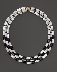 Faceted black onyx and freshwater pearls in 14K. yellow gold. Faceted black onyx and freshwater pearls in 14K. yellow gold.