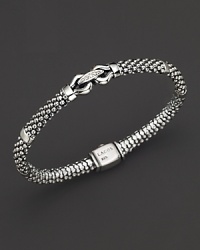 Faceted diamonds sparkle in a textured sterling silver setting. From the Derby collection by Lagos. Faceted diamonds sparkle in a textured sterling silver setting. From the Derby collection by Lagos.
