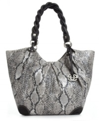 Update your seasonal look instantly with a little python print. This sleek silhouette by Mark Ecko is dressed up in shiny silver-tone hardware and braided shoulder straps with stud pyramid detailing, while a roomy interior lets you take along all the extras. Update your seasonal look instantly with a little python print. This sleek silhouette by Mark Ecko is dressed up in shiny silver-tone hardware and braided shoulder straps with stud pyramid detailing, while a roomy interior lets you take along all the extras.