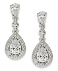 Frames of reverence. This pair of linear earrings from Eliot Danori is crafted from rhodium-plated brass with crystals and cubic zirconias (2 ct. t.w.) surrounding the edge, adding luster. Approximate drop: 1 inch. Frames of reverence. This pair of linear earrings from Eliot Danori is crafted from rhodium-plated brass with crystals and cubic zirconias (2 ct. t.w.) surrounding the edge, adding luster. Approximate drop: 1 inch.