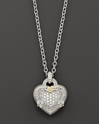 Pavé white sapphires glitter on this intricate heart pendant, strung on a gleaming sterling silver chain. A touch of 18Kgold detailing and a heart cutout at back add rich interest. Pavé white sapphires glitter on this intricate heart pendant, strung on a gleaming sterling silver chain. A touch of 18Kgold detailing and a heart cutout at back add rich interest.