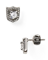 Crafted of plated metal, this pair of delicate studs earrings is fashion armor (or amour.) Crafted of plated metal, this pair of delicate studs earrings is fashion armor (or amour.)