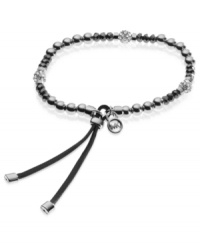 Stand out in silver tones. This stretch bracelet from Michael Kors is crafted from silver and gunmetal ion-plated mixed metal with glass fireball beads adding a bit of luster. Approximate diameter: 2-1/4 inches. Stand out in silver tones. This stretch bracelet from Michael Kors is crafted from silver and gunmetal ion-plated mixed metal with glass fireball beads adding a bit of luster. Approximate diameter: 2-1/4 inches.