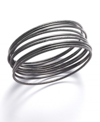 Capture the must-have trend of the season with stylish stackables. Nine stackable bangles by Alfani feature a textured design in hematite tone mixed metal. Approximate diameter: 2-3/4 inches. Capture the must-have trend of the season with stylish stackables. Nine stackable bangles by Alfani feature a textured design in hematite tone mixed metal. Approximate diameter: 2-3/4 inches.