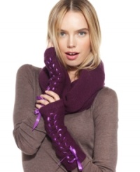 Cozy up with these eye-catching cashmere gloves, featuring a woven satin ribbon tied up in flirty bow. They're the ultimate conversation starter. Cozy up with these eye-catching cashmere gloves, featuring a woven satin ribbon tied up in flirty bow. They're the ultimate conversation starter.
