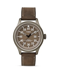 Rugged vintage style inspires this Timex watch, which features a classic dial with luminous hands and a leather strap as the complement. Rugged vintage style inspires this Timex watch, which features a classic dial with luminous hands and a leather strap as the complement.