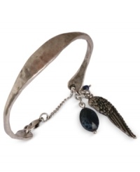 Take flight with this wing charm cuff bracelet from Lucky Brand. Crafted from silver-tone mixed metal, the bracelet features semi-precious calcite, azurite and lapis elements for a stylish touch. Approximate diameter: 2-5/8 inches. Take flight with this wing charm cuff bracelet from Lucky Brand. Crafted from silver-tone mixed metal, the bracelet features semi-precious calcite, azurite and lapis elements for a stylish touch. Approximate diameter: 2-5/8 inches.
