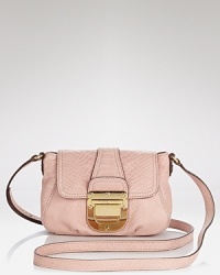 With crisp lines and gleaming hardware, MICHAEL Michael Kors latest bag gets down to business. This crossbody style has an adjustable strap, adding ease to your purse portfolio. With crisp lines and gleaming hardware, MICHAEL Michael Kors latest bag gets down to business. This crossbody style has an adjustable strap, adding ease to your purse portfolio.