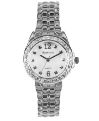 Simple elegance dressed up with a ring of shine. This Style&co watch features a silvertone alloy bracelet and round case. Crystal-accented bezel. White dial with studs at indices, logo and three hands. Quartz movement. Two-year limited warranty. Simple elegance dressed up with a ring of shine. This Style&co watch features a silvertone alloy bracelet and round case. Crystal-accented bezel. White dial with studs at indices, logo and three hands. Quartz movement. Two-year limited warranty.
