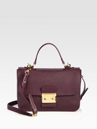 A structured design in supple leather with a detachable shoulder strap.Top handle, 4½ dropDetachable adjustable shoulder strap, 20½-22¾ dropPush-lock flap closureThree inner compartmentsOne inside zip pocketOne inside open pocketSuede lining11W X 8H X 4½DMade in Italy A structured design in supple leather with a detachable shoulder strap.Top handle, 4½ dropDetachable adjustable shoulder strap, 20½-22¾ dropPush-lock flap closureThree inner compartmentsOne inside zip pocketOne inside open pocketSuede lining11W X 8H X 4½DMade in Italy