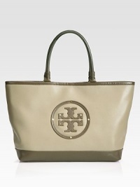 The perfect carryall, this leather design features a roomy size with a chic, logo detail.Double top handle, 6¾ dropMagnetic top closureRivet accented leather logo detailOne inside zip pocketTwo inside open pocketsFully lined19.5W X 12.25H X 4DImported The perfect carryall, this leather design features a roomy size with a chic, logo detail.Double top handle, 6¾ dropMagnetic top closureRivet accented leather logo detailOne inside zip pocketTwo inside open pocketsFully lined19.5W X 12.25H X 4DImported
