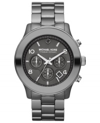A chronograph timepiece built-tough with dusky titanium from Michael Kors' Runway collection. A chronograph timepiece built-tough with dusky titanium from Michael Kors' Runway collection.