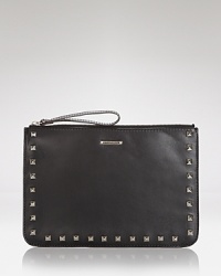 Equal parts edgy and effortless, this Rebecca Minkoff wristlet is pretty with a punk side, crafted of leather with studded detailing. Equal parts edgy and effortless, this Rebecca Minkoff wristlet is pretty with a punk side, crafted of leather with studded detailing.