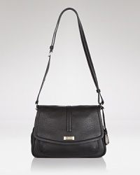 Brighten up your purse portfolio with Cole Haan's crossbody bag. In a crave-worthy hue and classic shape, this bag strikes an enviable balance between trendy and timeless. Brighten up your purse portfolio with Cole Haan's crossbody bag. In a crave-worthy hue and classic shape, this bag strikes an enviable balance between trendy and timeless.