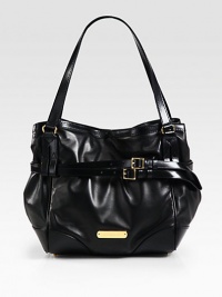 Luxurious leather in a roomy carryall style with chic double wrap, buckled straps.Double shoulder straps, 8½ dropMagnetic snap closureProtective metal feetOne inside zip pocketTwo inside open pocketsFully lined10W X 11H X 5½DMade in Italy Luxurious leather in a roomy carryall style with chic double wrap, buckled straps.Double shoulder straps, 8½ dropMagnetic snap closureProtective metal feetOne inside zip pocketTwo inside open pocketsFully lined10W X 11H X 5½DMade in Italy