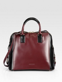 An elegant colorblocked leather style with a convenient shoulder strap.Double top handles, 5 dropShoulder strap, 19 dropTop zip closureThree inside open pocketsLeather lining13½W X 11H X 7¼DMade in Italy An elegant colorblocked leather style with a convenient shoulder strap.Double top handles, 5 dropShoulder strap, 19 dropTop zip closureThree inside open pocketsLeather lining13½W X 11H X 7¼DMade in Italy