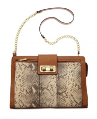 Get noticed in this striking python print shoulder bag from BCBGMAXAZRIA. A luxe chain strap, contrast trim and chic silhouette will bring a posh appeal to any ensemble. Get noticed in this striking python print shoulder bag from BCBGMAXAZRIA. A luxe chain strap, contrast trim and chic silhouette will bring a posh appeal to any ensemble.