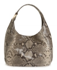 Look close: this glazed, embossed reptile-leather purse is creatively stylish, with a shoulder strap that extends from the elegant body at one side and secures to the other side with 18K gold MK hardware. Perfectly posh. Look close: this glazed, embossed reptile-leather purse is creatively stylish, with a shoulder strap that extends from the elegant body at one side and secures to the other side with 18K gold MK hardware. Perfectly posh.