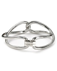Michael Kors elegantly entwined bangle makes a modern token of love. Michael Kors elegantly entwined bangle makes a modern token of love.