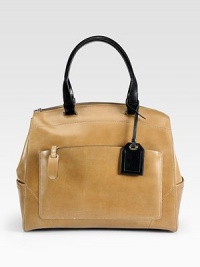 A structured style in polished calf leather, perfect for all your daily essentials.Double top handles, 7 dropTop zip closureOne outside zip pocketThree outside open pocketsOne inside zip pocketTwo inside open pocketsCotton lining14½W X 13½H X 4DImported A structured style in polished calf leather, perfect for all your daily essentials.Double top handles, 7 dropTop zip closureOne outside zip pocketThree outside open pocketsOne inside zip pocketTwo inside open pocketsCotton lining14½W X 13½H X 4DImported