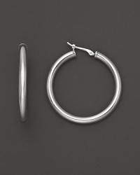 Simply chic, these 14K. white gold hoops are timeless classics. Simply chic, these 14K. white gold hoops are timeless classics.