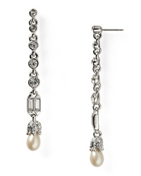 Make room in your jewelry box for this pair of graduated linear earrings from Carolee, delicately accented by striking crystals and pearl stones. Make room in your jewelry box for this pair of graduated linear earrings from Carolee, delicately accented by striking crystals and pearl stones.