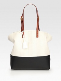 Tonal stripes of straw pairs with rich leather trim in this roomy zip-top bag.Adjustable leather shoulder straps, 8¾-10¼ dropTop zip closureTwo inside open pocketsCenter zip compartmentLinen lining11W X 13H X 5¼DMade in Italy Tonal stripes of straw pairs with rich leather trim in this roomy zip-top bag.Adjustable leather shoulder straps, 8¾-10¼ dropTop zip closureTwo inside open pocketsCenter zip compartmentLinen lining11W X 13H X 5¼DMade in Italy