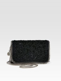 This faux fur design is accented with a link chain and whip stitch details.Link chain shoulder strap, 25 dropMagnetic snap flap closureThree inner compartmentsOne inside open pocketFully lined8W X 4½H X 1½DMade in Italy This faux fur design is accented with a link chain and whip stitch details.Link chain shoulder strap, 25 dropMagnetic snap flap closureThree inner compartmentsOne inside open pocketFully lined8W X 4½H X 1½DMade in Italy