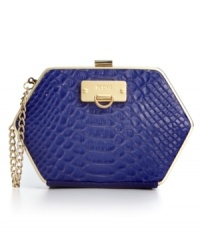 Give in to the exotic with this posh animal-print clutch from Bodhi. Luxe leather is outfitted with golden detailing, while the interior stows your iPhone and other out-on-the-town essentials with ease. Give in to the exotic with this posh animal-print clutch from Bodhi. Luxe leather is outfitted with golden detailing, while the interior stows your iPhone and other out-on-the-town essentials with ease.