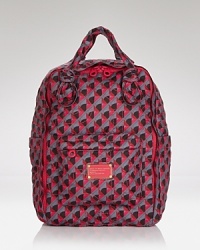 Soft and spacious, MARC BY MARC JACOBS' roomy nylon backpack is a must-have for every downtown girl and the coolest way to carry your essentials this season. Soft and spacious, MARC BY MARC JACOBS' roomy nylon backpack is a must-have for every downtown girl and the coolest way to carry your essentials this season.