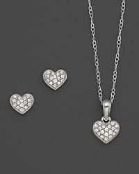 Young and glamorous: Mini diamond heart earrings and pendant necklace in white gold. Young and glamorous: Mini diamond heart earrings and pendant necklace in white gold.
