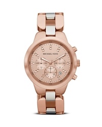 Rose gold jewelry is a must this season, so this crystal-decked piece from MICHAEL Michael Kors is one to watch. Its bold face and two-tone bracelet ensures statement style while features like its date window and advanced movement perfect practicality. Rose gold jewelry is a must this season, so this crystal-decked piece from MICHAEL Michael Kors is one to watch. Its bold face and two-tone bracelet ensures statement style while features like its date window and advanced movement perfect practicality.